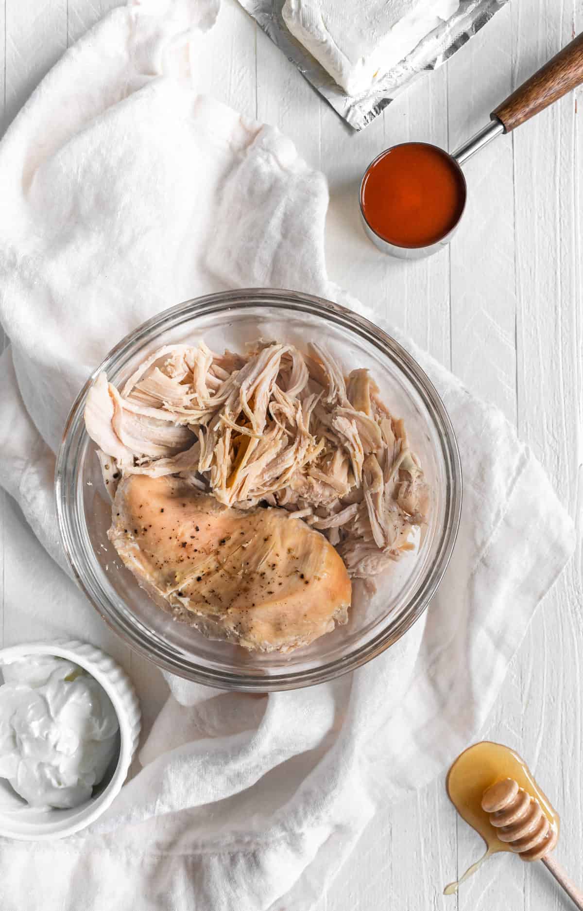 Shredded chicken in a bowl. 