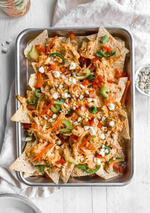 a sheet pan of buffalo chicken nachos