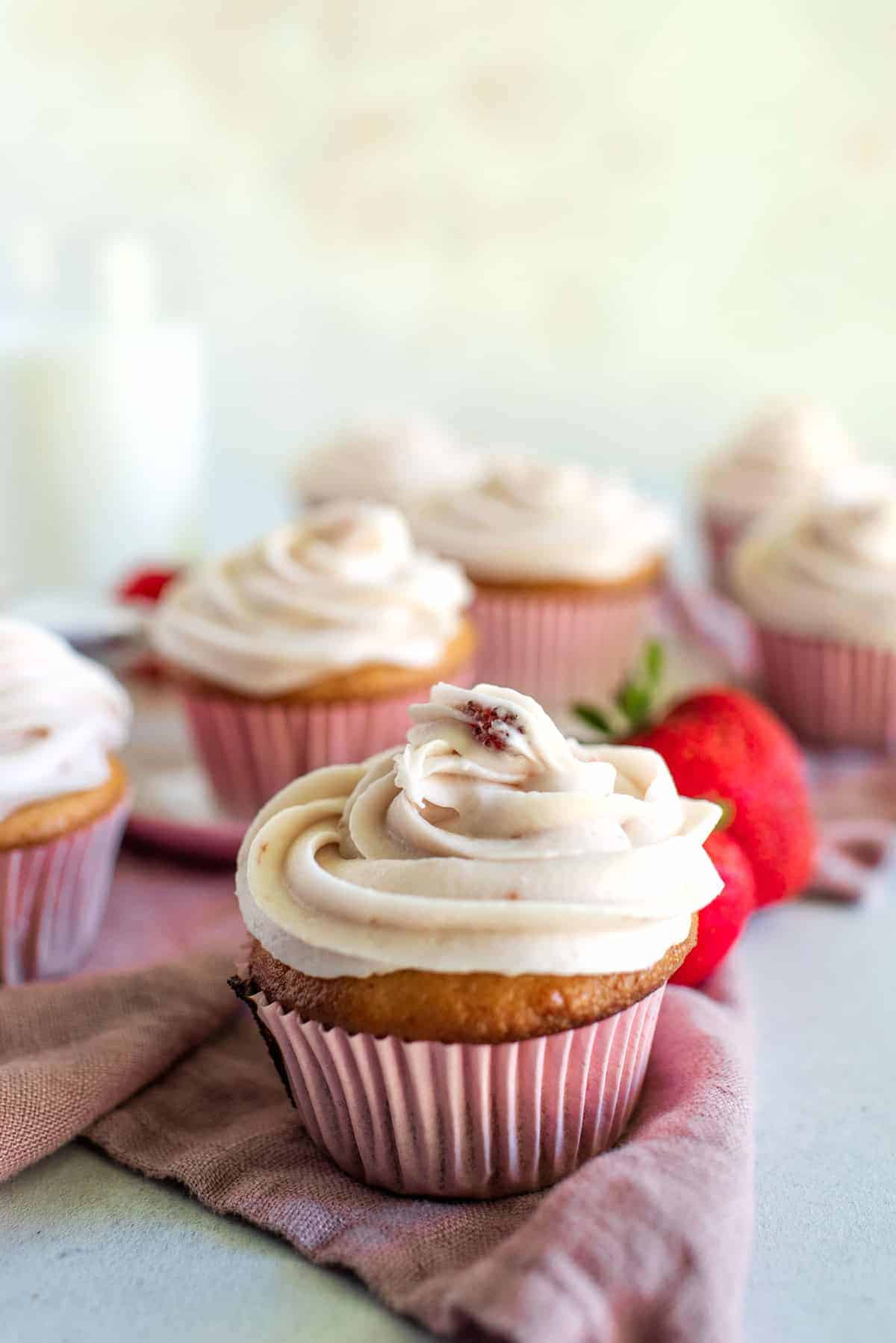 strawberry cream cheese frosted cupcake.