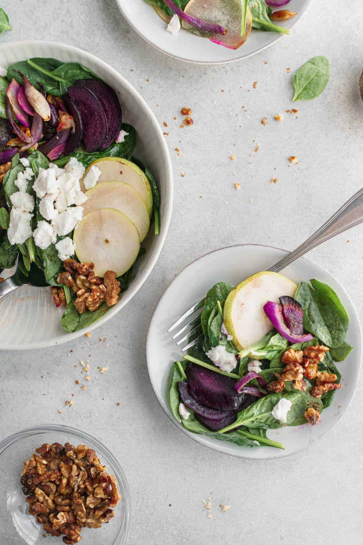 Bowls of beet goat cheese salads. 