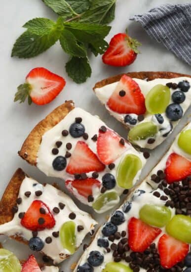 slices of fruit pizza on a plate.