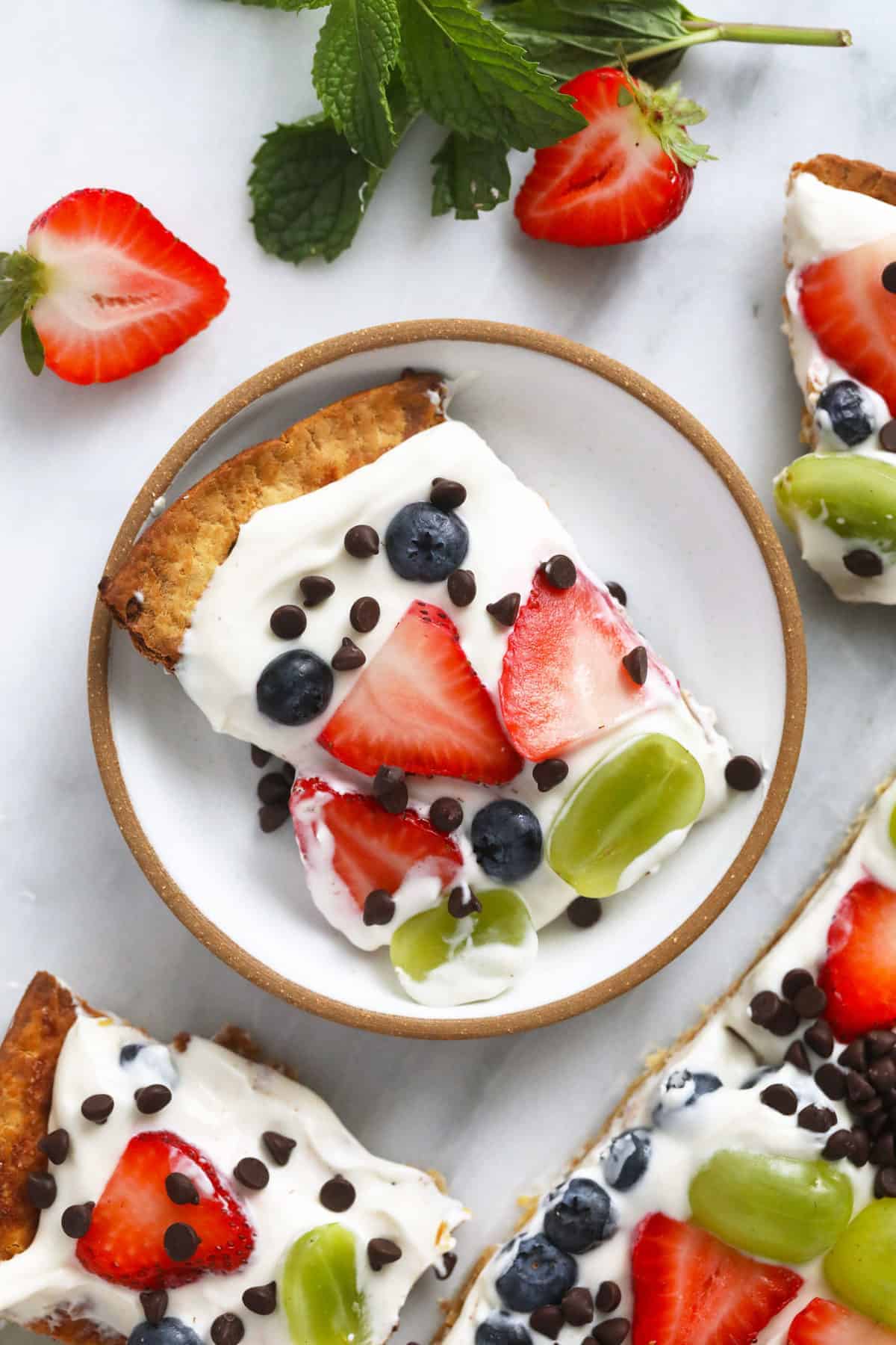 A piece of fruit pizza on a plate! 