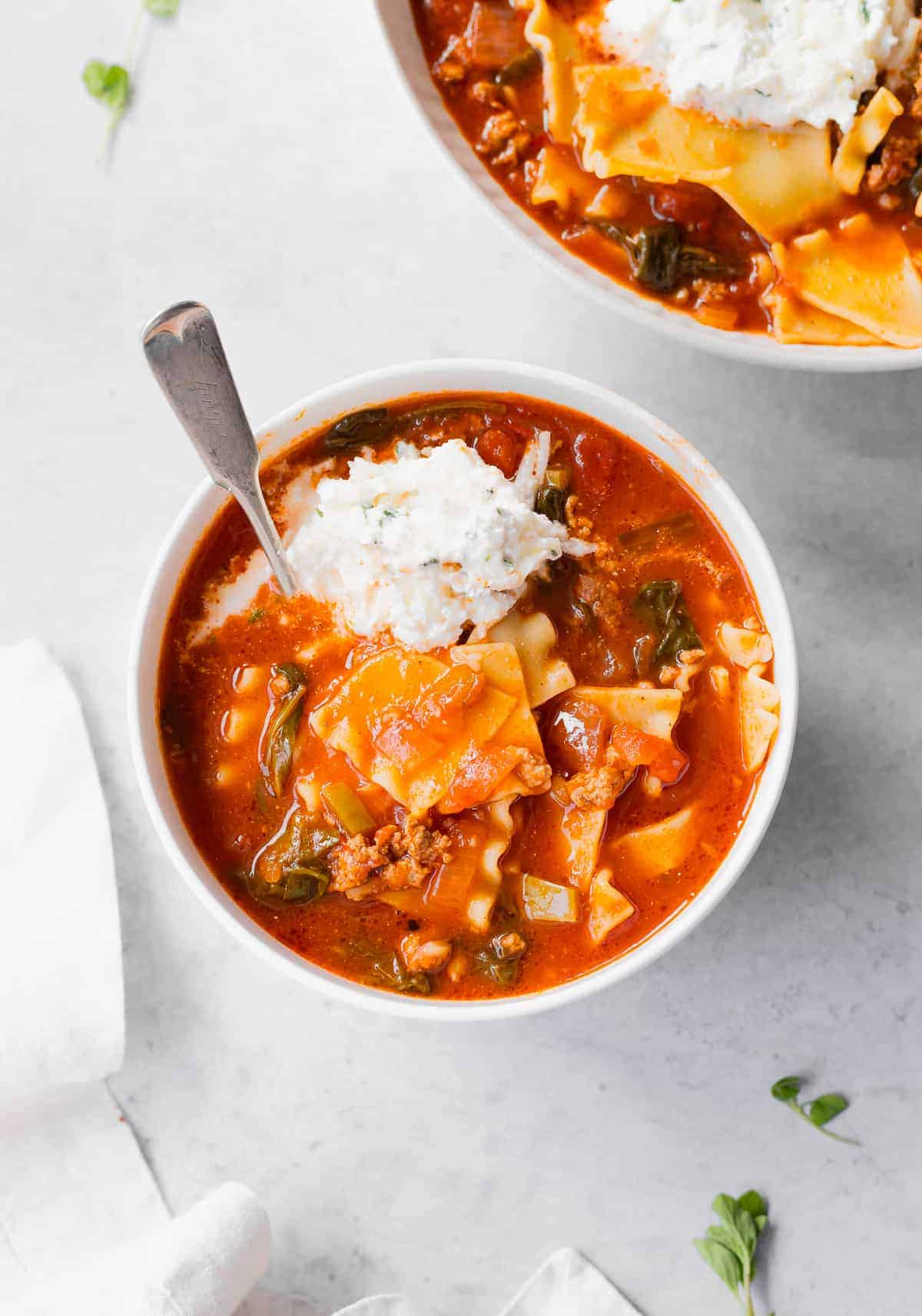 Lasagna soup in two bowls. 