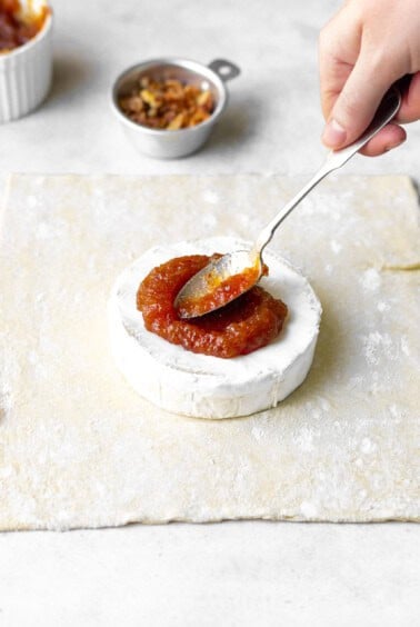spreading on fig jam.