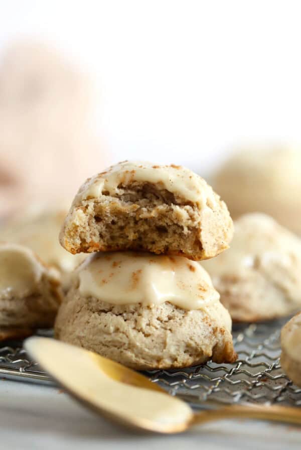 a stack of cream cheese cookies on a cooling rack.