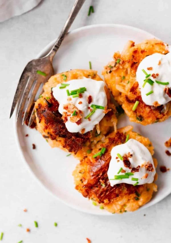 a plate of 3 cheesy potato pancakes