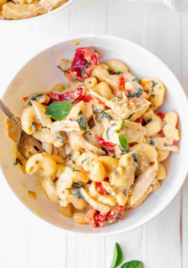 a bowl of tuscan chicken mac and cheese