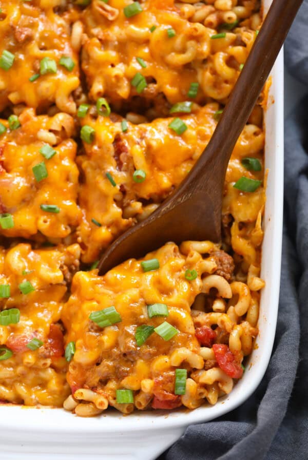 Casserole cut into squares in dish.