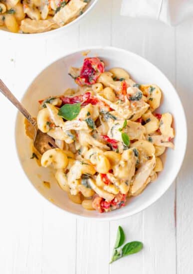 tuscan chicken mac and cheese in a bowl
