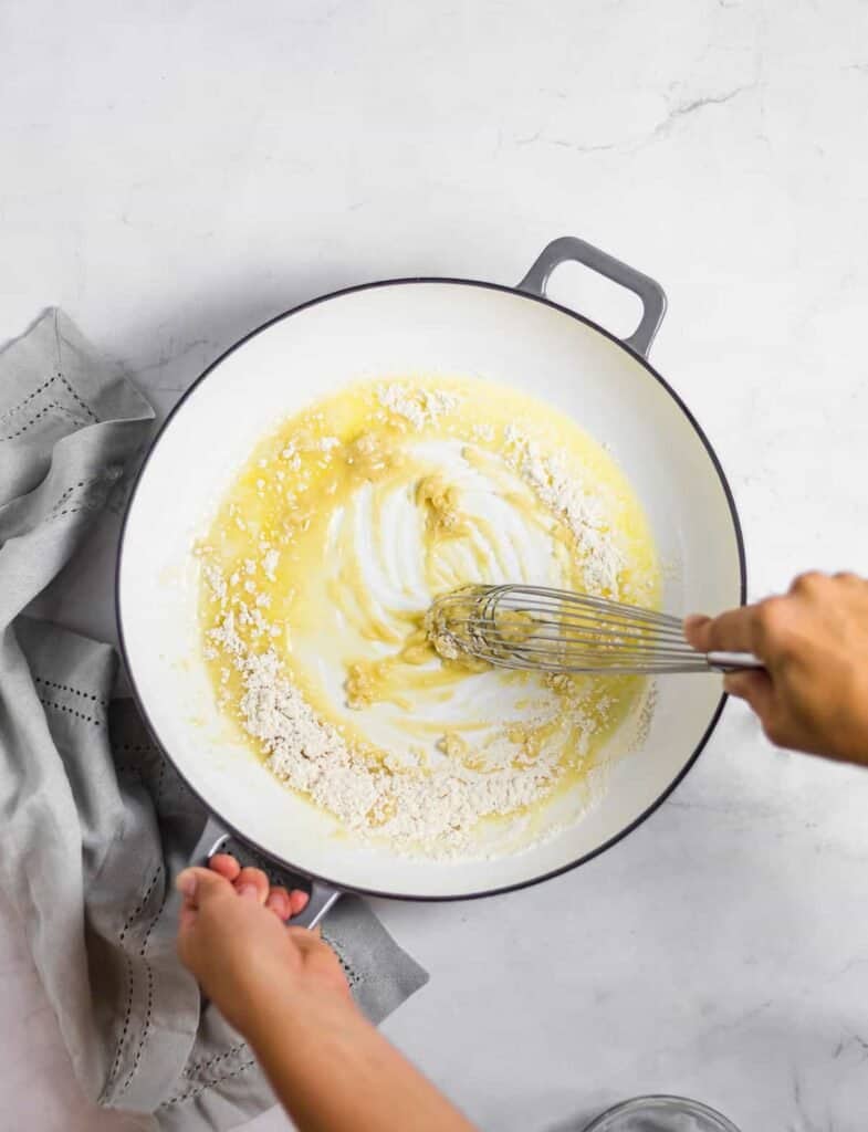 whisking flour and butter for roux