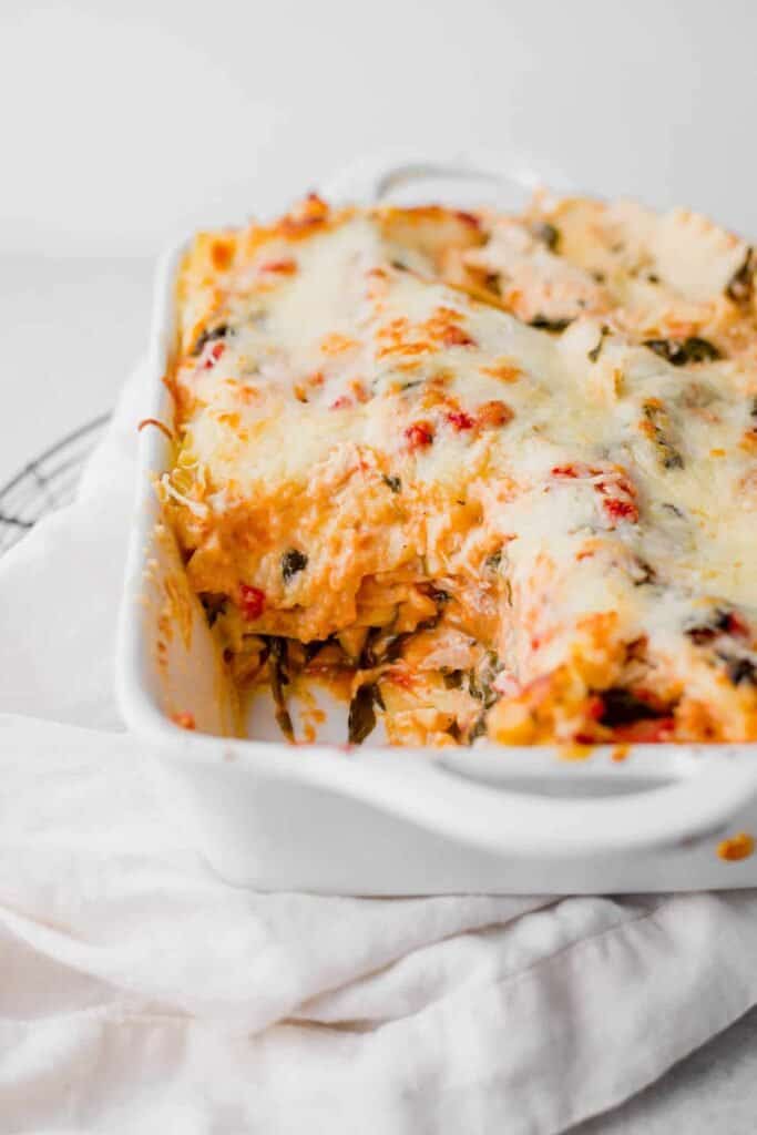 Chicken Alfredo Lasagna in a casserole dish. 