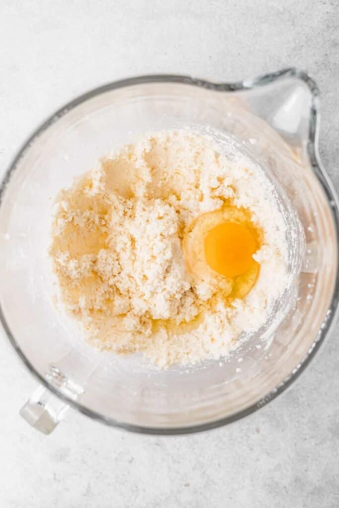 All the ingredients for ricotta cookies in a bowl. 