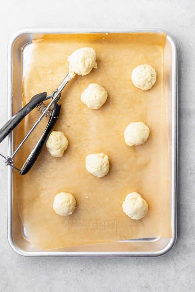 Ricotta cookies on a tray. 
