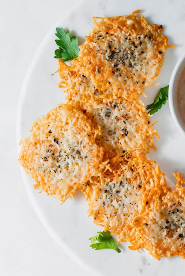 a plate with a bowl of dipping sauce.