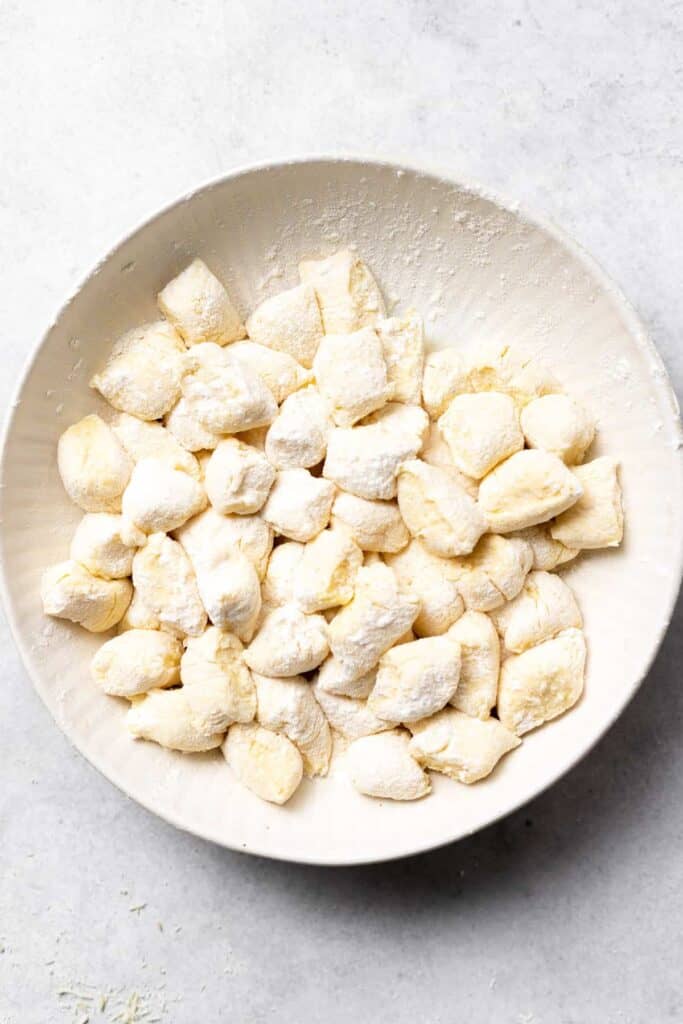ricotta gnocchi in a bowl, ready to be boiled