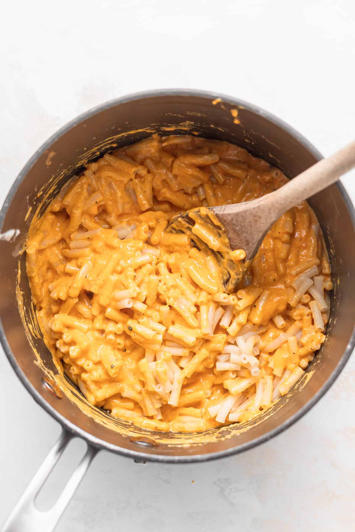 Mac and cheese in a sauce pan. 