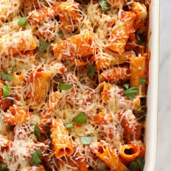Baked chicken parmesan in a casserole dish.