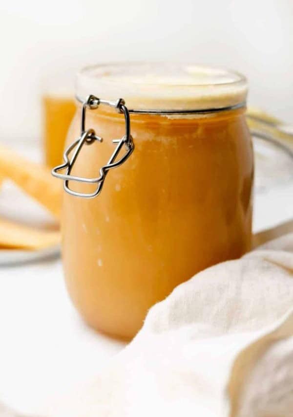 a mason jar of parmesan broth