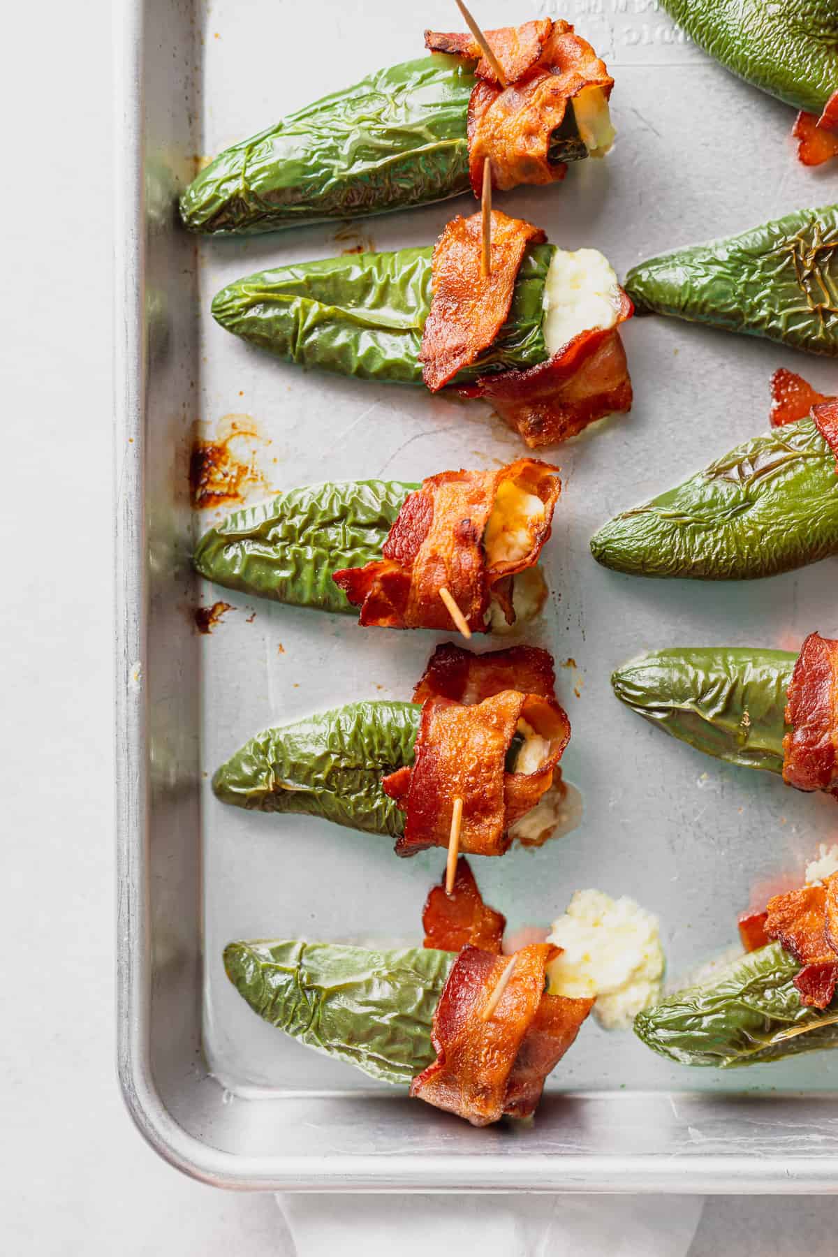 Jalapeño Poppers on a baking sheet.