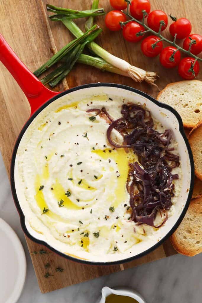 whipped feta dip topped with caramelized onions