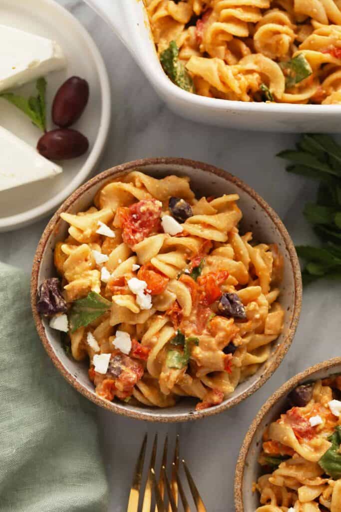 baked feta pasta with tomatoes in a bowl