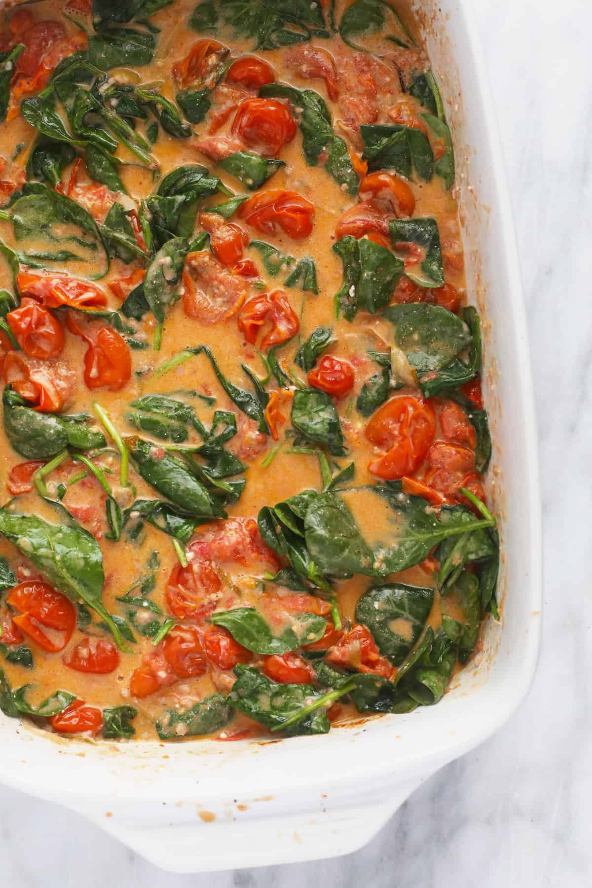 Baked Goat Cheese Pasta in a casserole dish. 