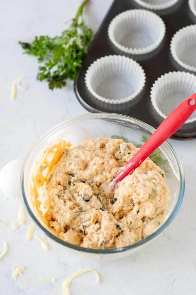 savory cheese muffin batter, ready to be poured into muffin liners and baked