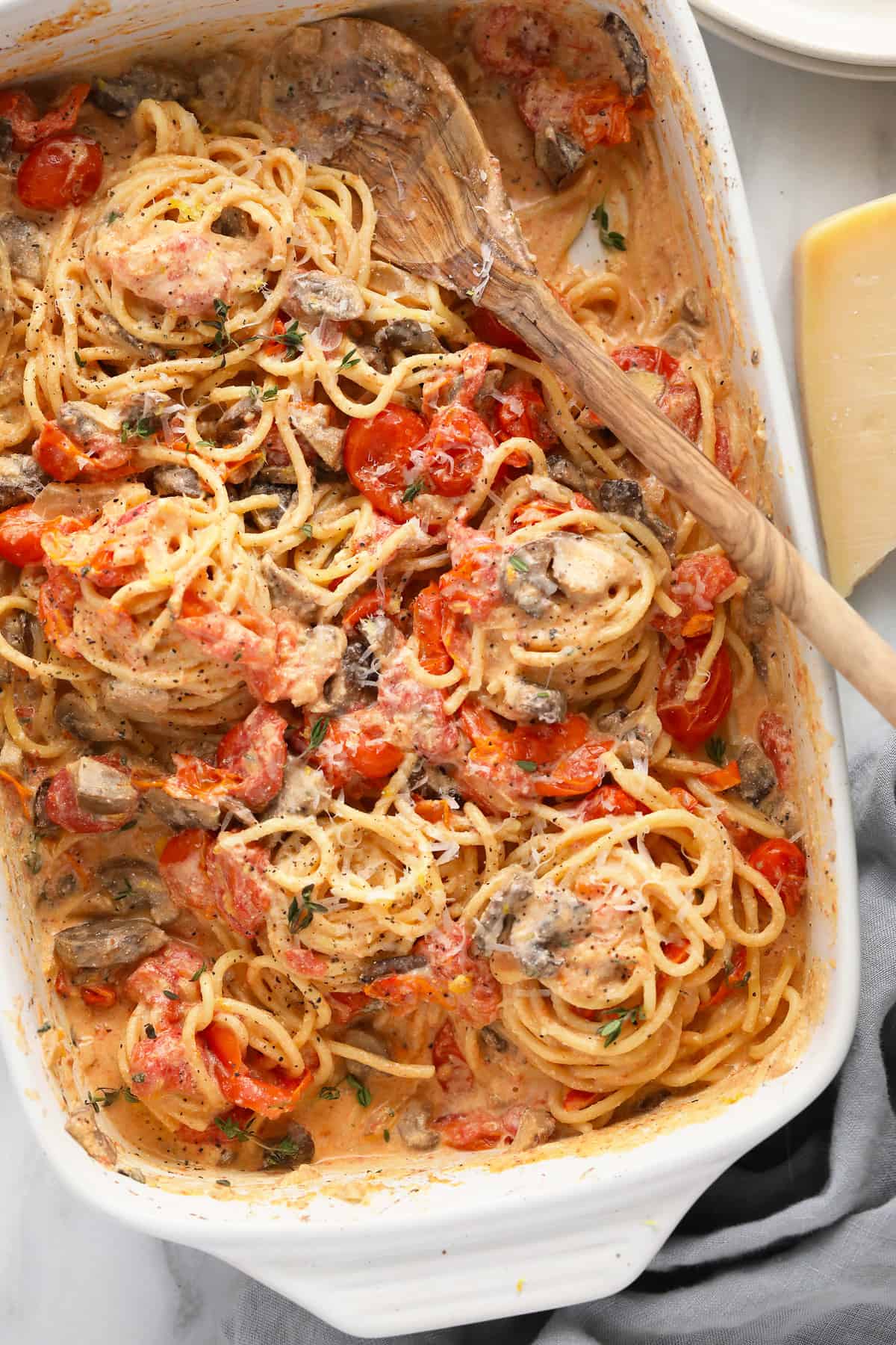 Baked cream cheese pasta tossed together with spaghetti and ready to be served.