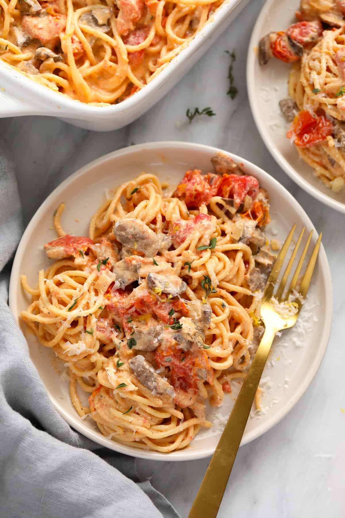 Baked cream cheese pasta on a plate, ready to be served.