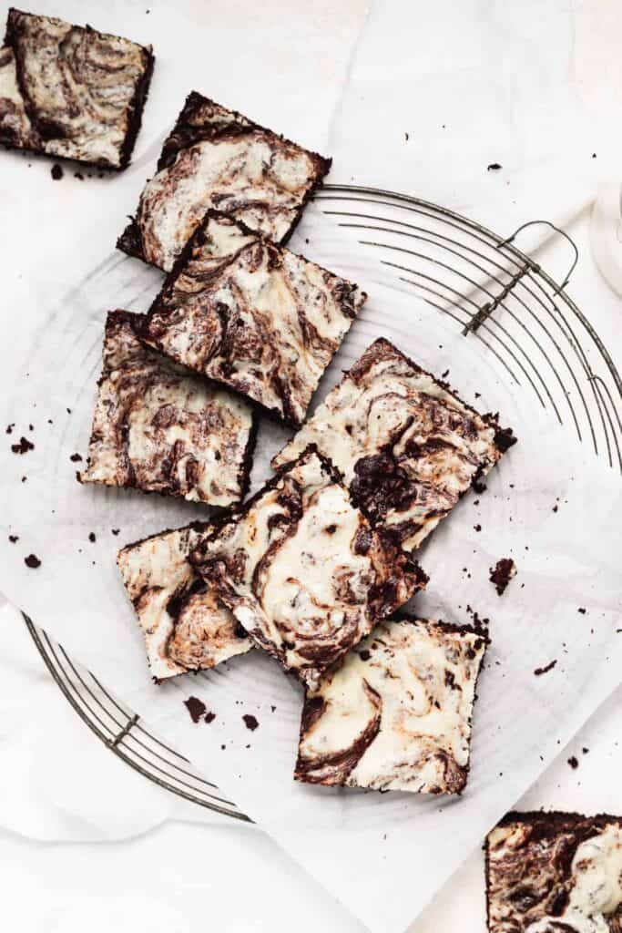 Cream cheese brownies on a cooling rack. 