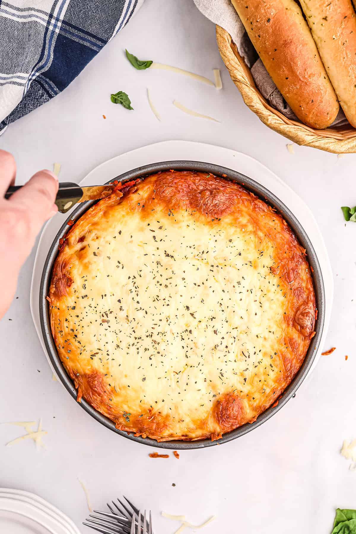 slicing honeycomb pasta in springform pan