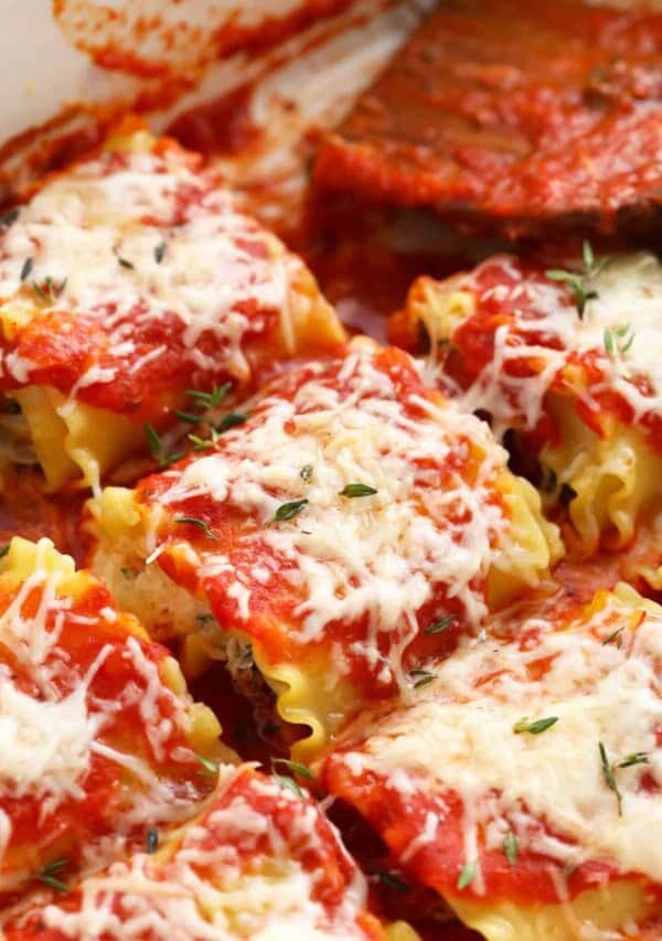 a pan of kale lasagna roll ups
