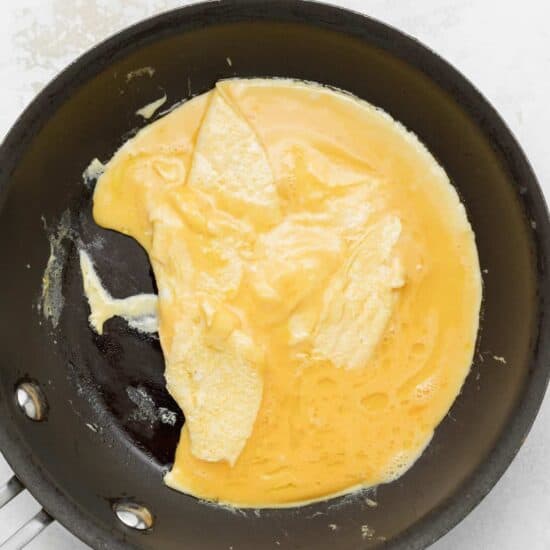 a fried egg in a frying pan.