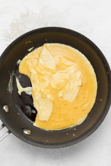 a fried egg in a frying pan.