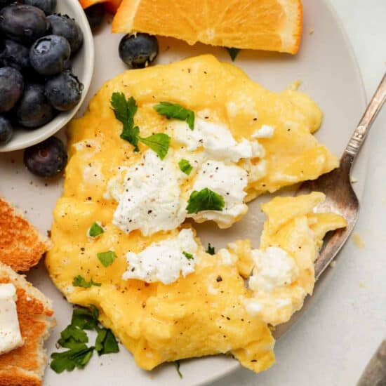 Say goodbye to dry scrambled eggs and hello to these goat cheese soft scrambled eggs. Here is a step-by-step way to make the scrambled eggs that you’ll never forget!