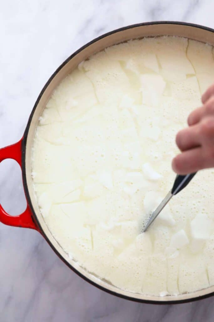 Cutting queso fresco. 