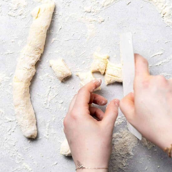 slicing ricotta gnocchi dough