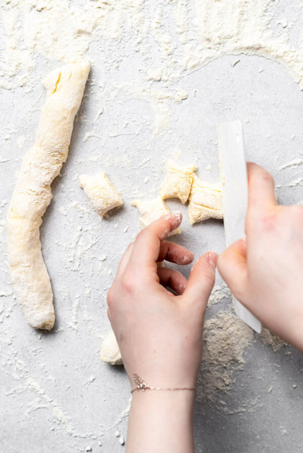 slicing ricotta gnocchi dough