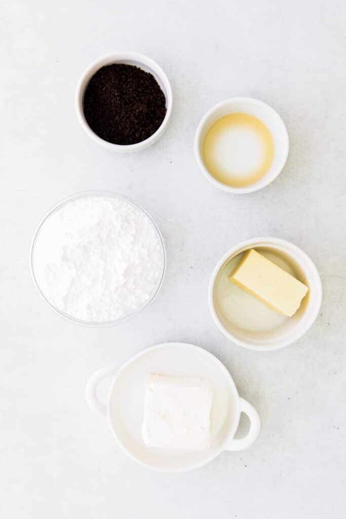 Cookies and Cream Cupcakes are made with a seriously delicious chocolate oreo cupcake and topped with cookies and cream frosting! frosting ingredients on countertop