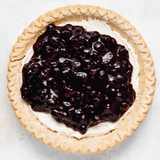 Blueberry topping on cream cheese filling.