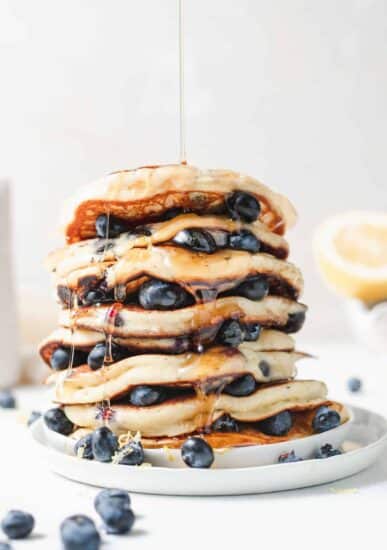 stack of ricotta pancakes on plate