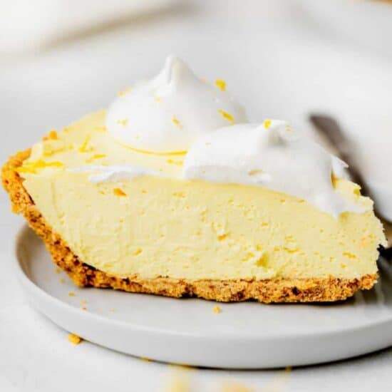 a slice of cream cheese lemonade pie on a plate