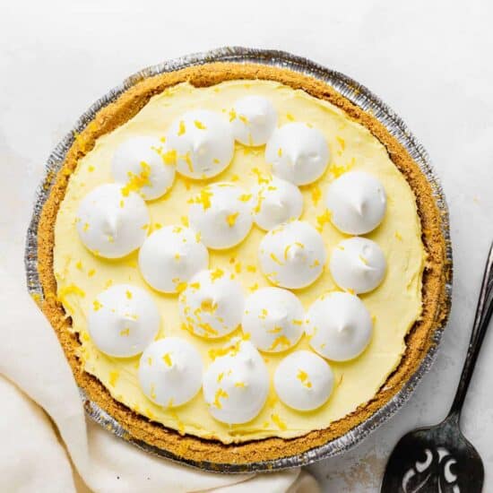 Cream Cheese lemonade pie with whipped cream on top