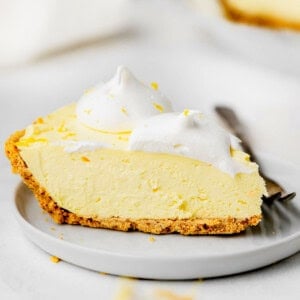 Cream Cheese Lemonade Pie slice on a plate.
