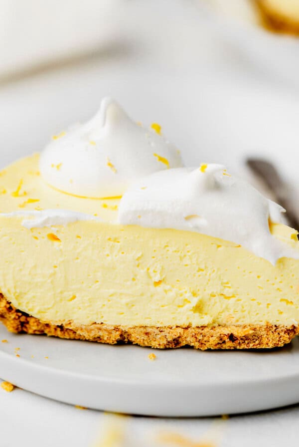 Cream Cheese Lemonade Pie slice on a plate.