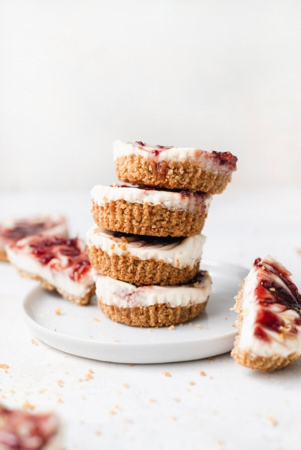 Stacked lemon raspberry cheesecake bites.