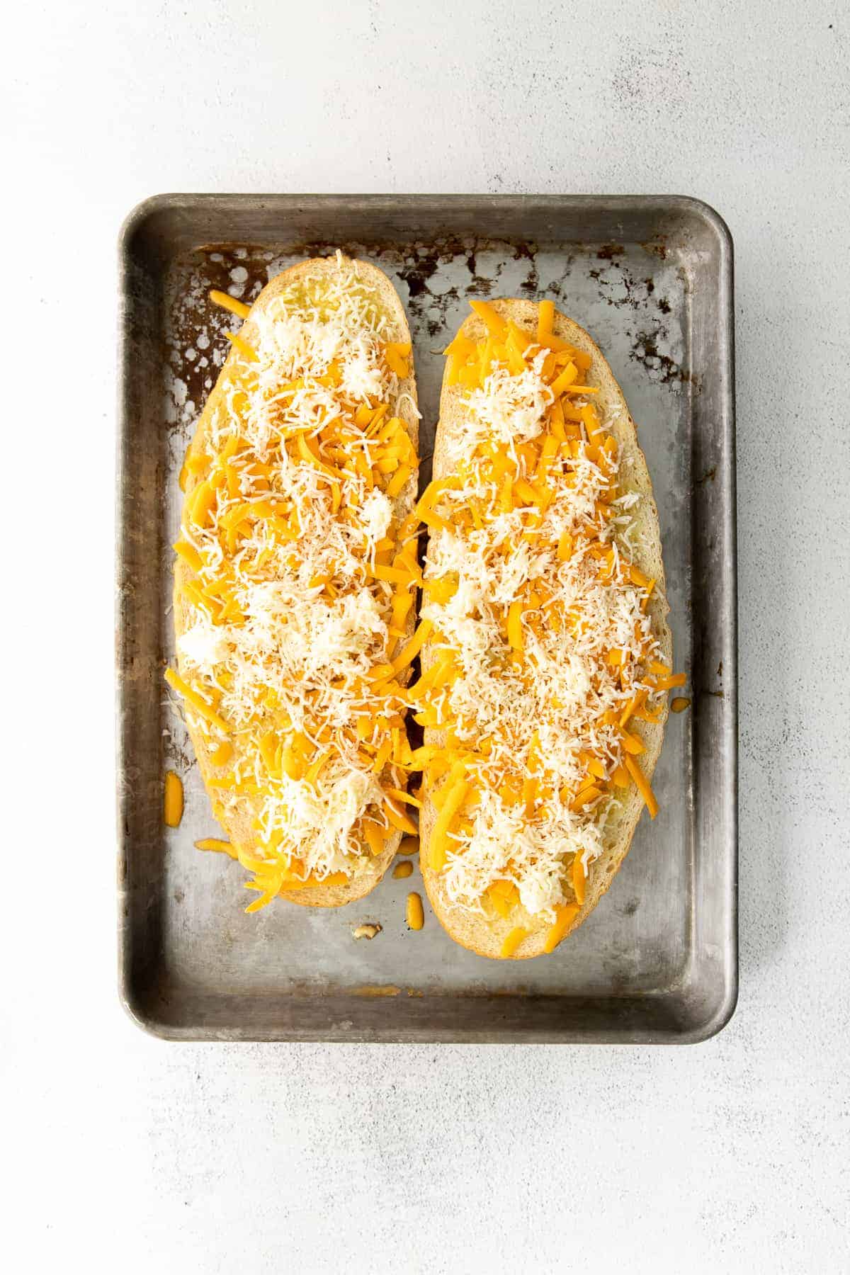 Garlic bread with cheese before you bake it! 