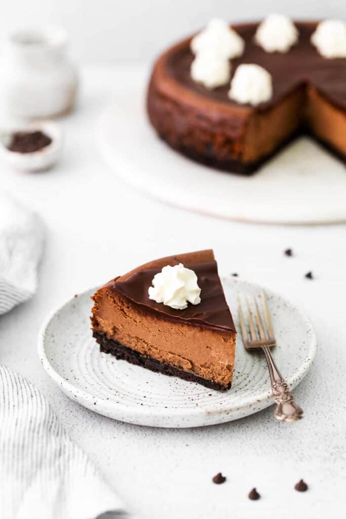 slice of chocolate cheesecake on plate