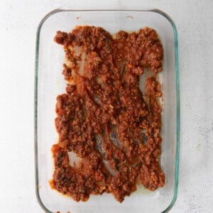 a glass baking dish with meat in it.