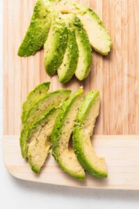 avocado on cutting board.